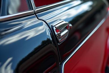 Detailed view of a car's exterior paint and interior upholstery after a full detail